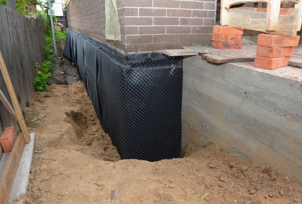 SJ Waterproofing Pros technician performing targeted Crawl Space Encapsulation assessment in Jacksonville, AL